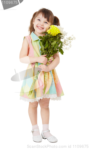 Image of Smiling happy girl with big bouquet of asters