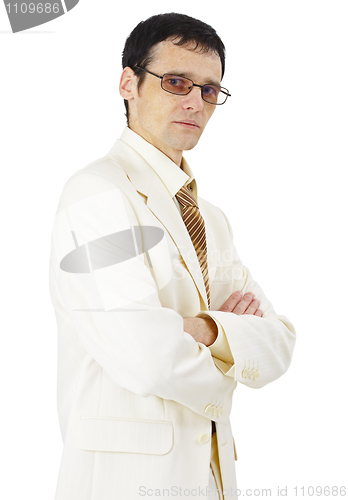 Image of Young man in white suit