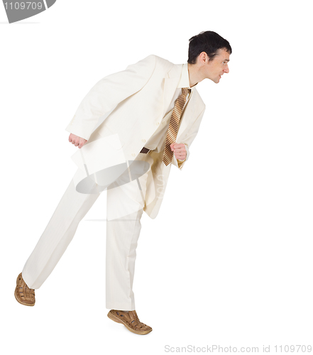 Image of Aggressive young man in a light suit