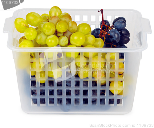 Image of Basket with grapes on white background