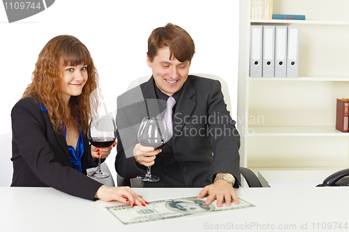 Image of Partners in business celebrate reception of big income