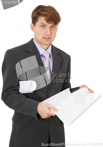 Image of Young engineer with blueprints