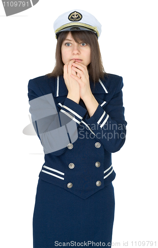 Image of Scared woman in uniform of sea captain isolated on a white