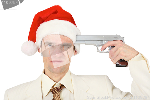 Image of Man in Christmas hat tries to shoot himself