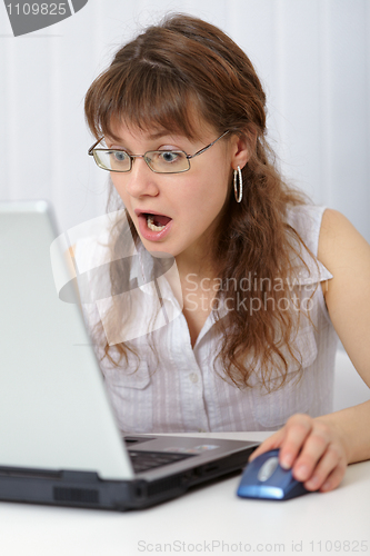 Image of Young woman socialize on Internet in social networks