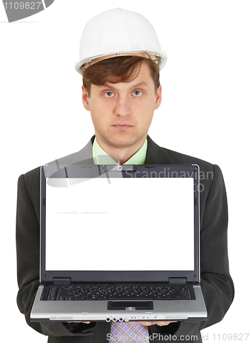 Image of Specialist - builder with computer demonstrates screen