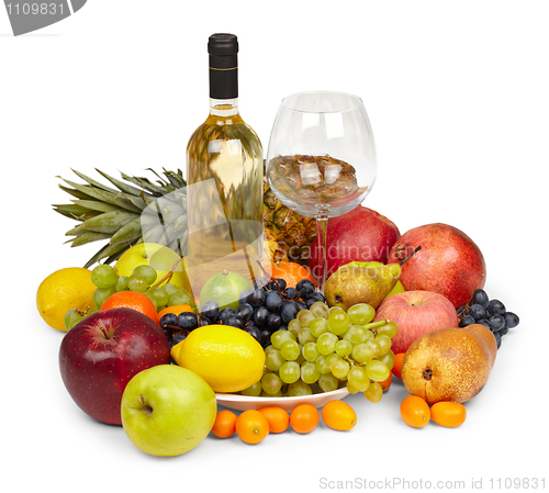 Image of Still Life - heap of fruits and bottle of white wine