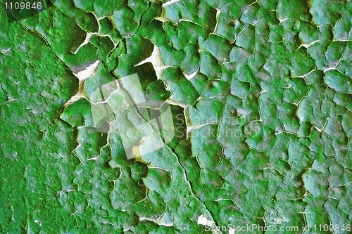 Image of Old cracked paint green wall