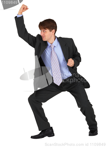Image of Businessman punching up on white background