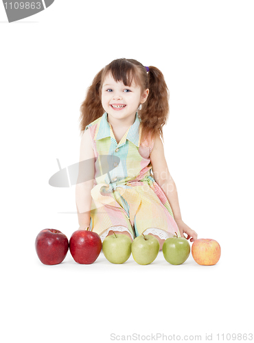 Image of Happy girl playing with apples on white background