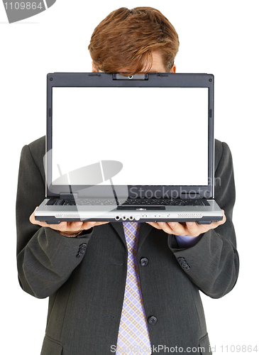 Image of Businessman hiding behind computer screen