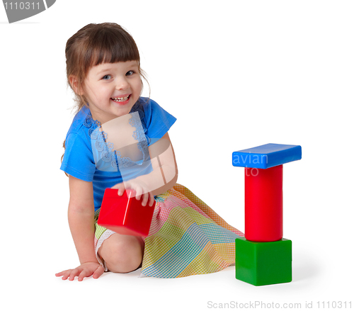 Image of Girl playing with toys