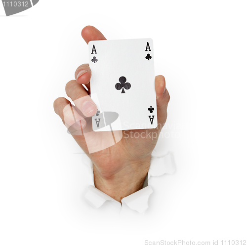 Image of Hand holds ace of clubs isolated on white background