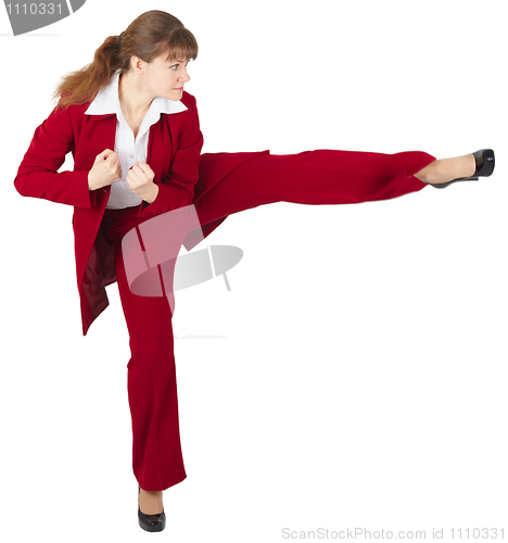 Image of Young girl kicks, on white background