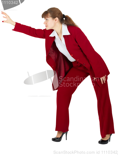 Image of Young woman makes an aggressive gesture