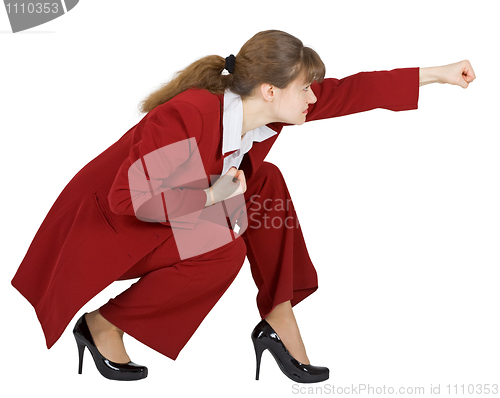 Image of Businesswoman in combat position on white