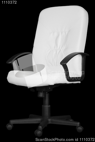 Image of Large white office chair isolated on black