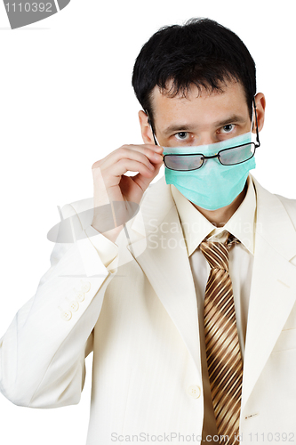 Image of Doctor of Medical Sciences is looking over glasses