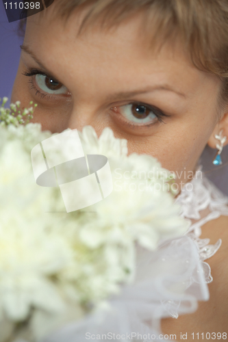 Image of Bride with bouquet - eyes closeup