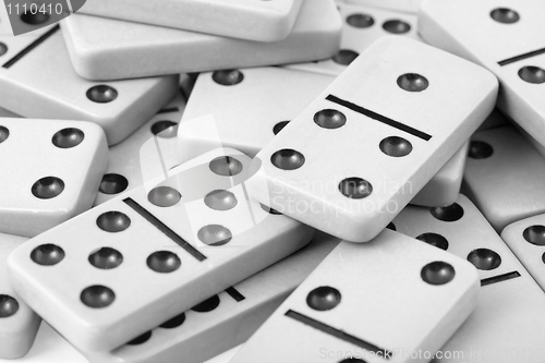 Image of Old gray dominoes close up