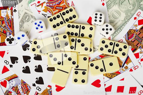 Image of Background - playing cards, dice, money, and dominoes