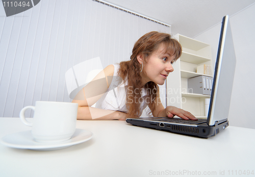 Image of Young woman keen on watching pornographic sites on Internet