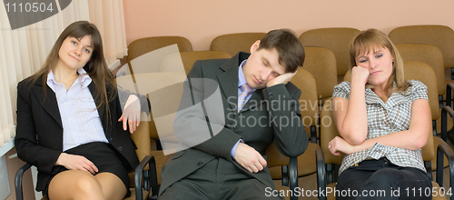 Image of Businessman has fallen asleep sitting at conference