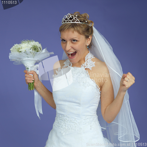 Image of Bride in white dress shouts with happiness