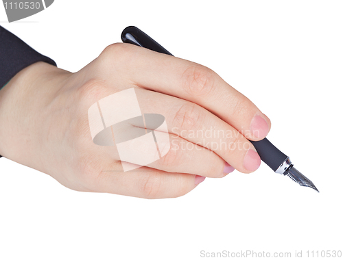 Image of Hand holds an ancient pen