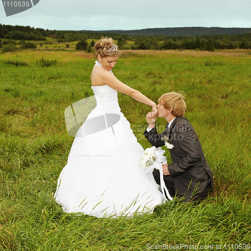 Image of Groom to genuflect near bride