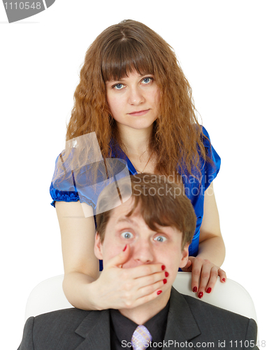 Image of Woman closed mouth to man