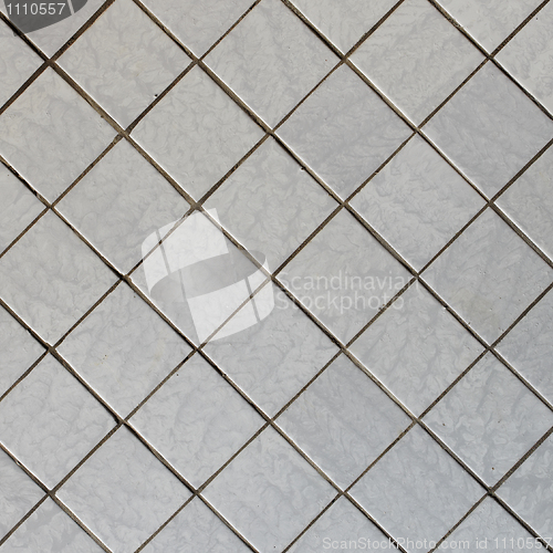 Image of Wall covered with tile - diagonal square texture