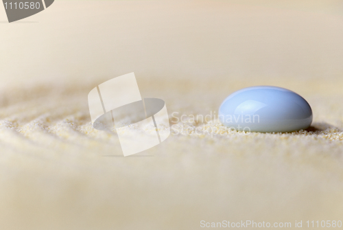 Image of Composition of yellow sand and white pebble