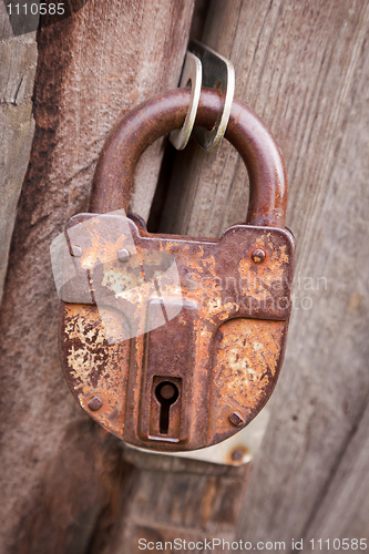 Image of Big ancient rusty padlock