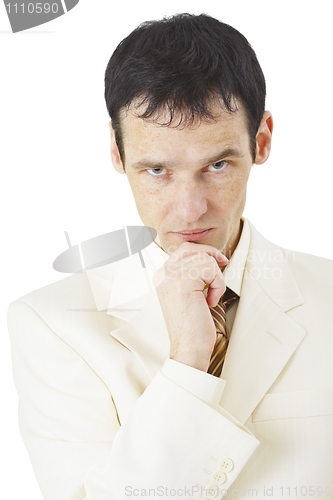 Image of Portrait of serious and attentive businessman