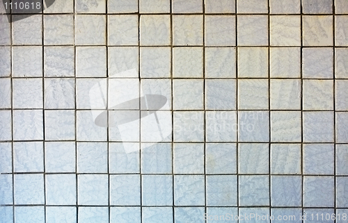 Image of Wall covered with old tile - background