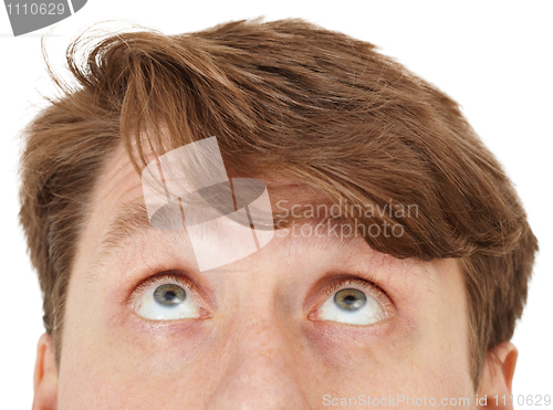 Image of Eyes of man look upwards, close up