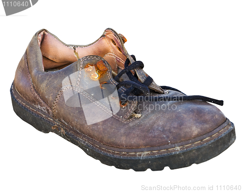 Image of Old worn-out rotten shoe on white