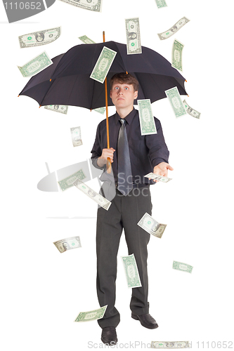 Image of Businessman came under rain of money
