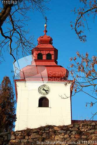 Image of Catholic church with steeple clock