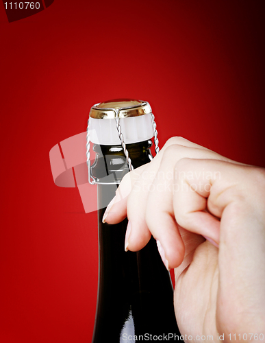 Image of Opening champagne bottle