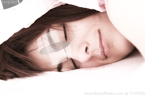 Image of Beautiful young woman sleeping.