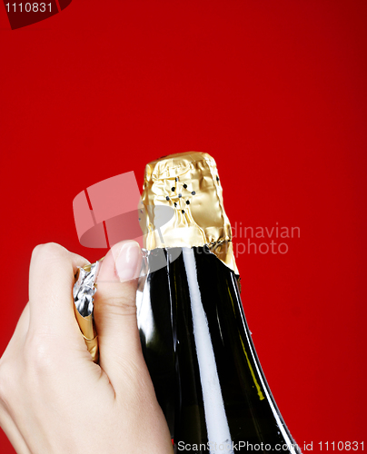 Image of Opening champagne bottle