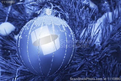 Image of Christmas decoration hanging on a tree