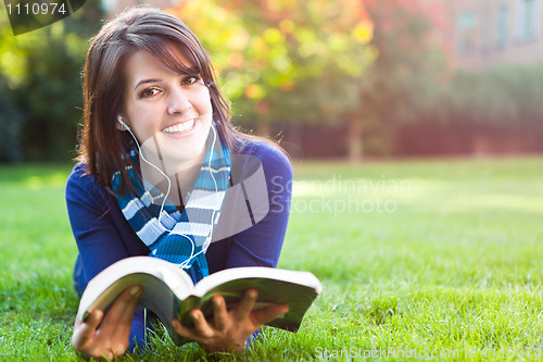 Image of Mixed race college student studying