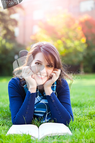 Image of Mixed race college student studying