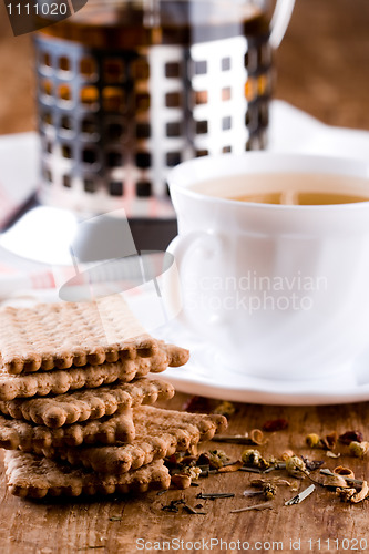 Image of herbal tea and some fresh cookies 