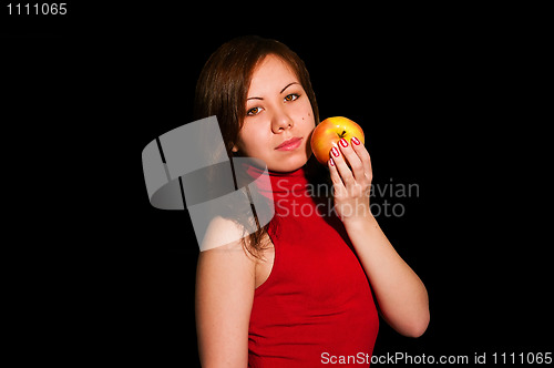 Image of smiling woman with apple