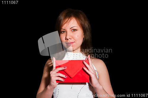 Image of Pretty young business woman with envelope