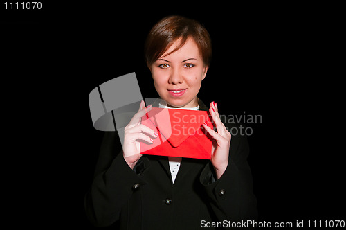 Image of Pretty young business woman with envelope